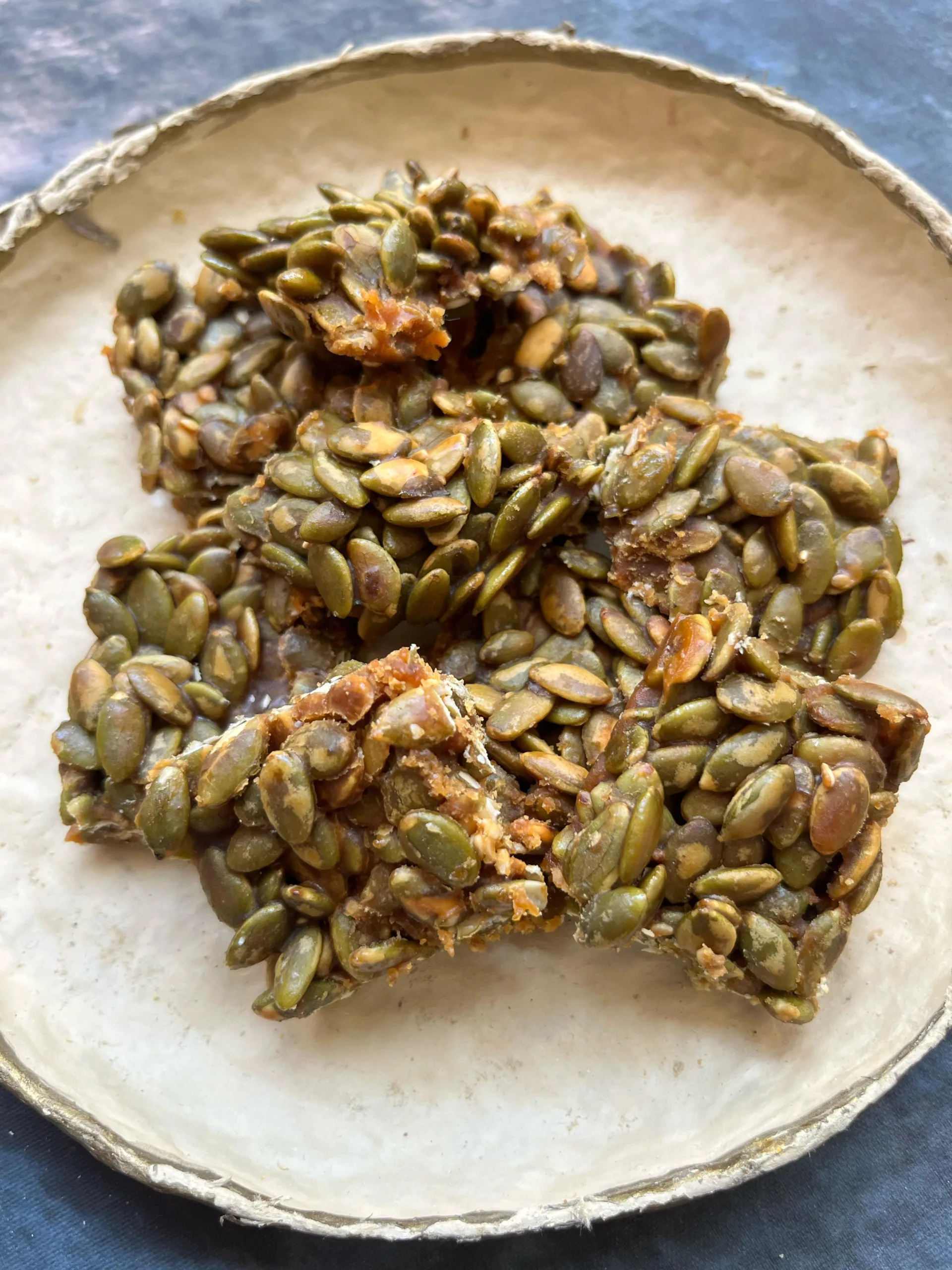 Pumpkin-chikki-scaled-2.webp Pumpkin Chikki - Image 1